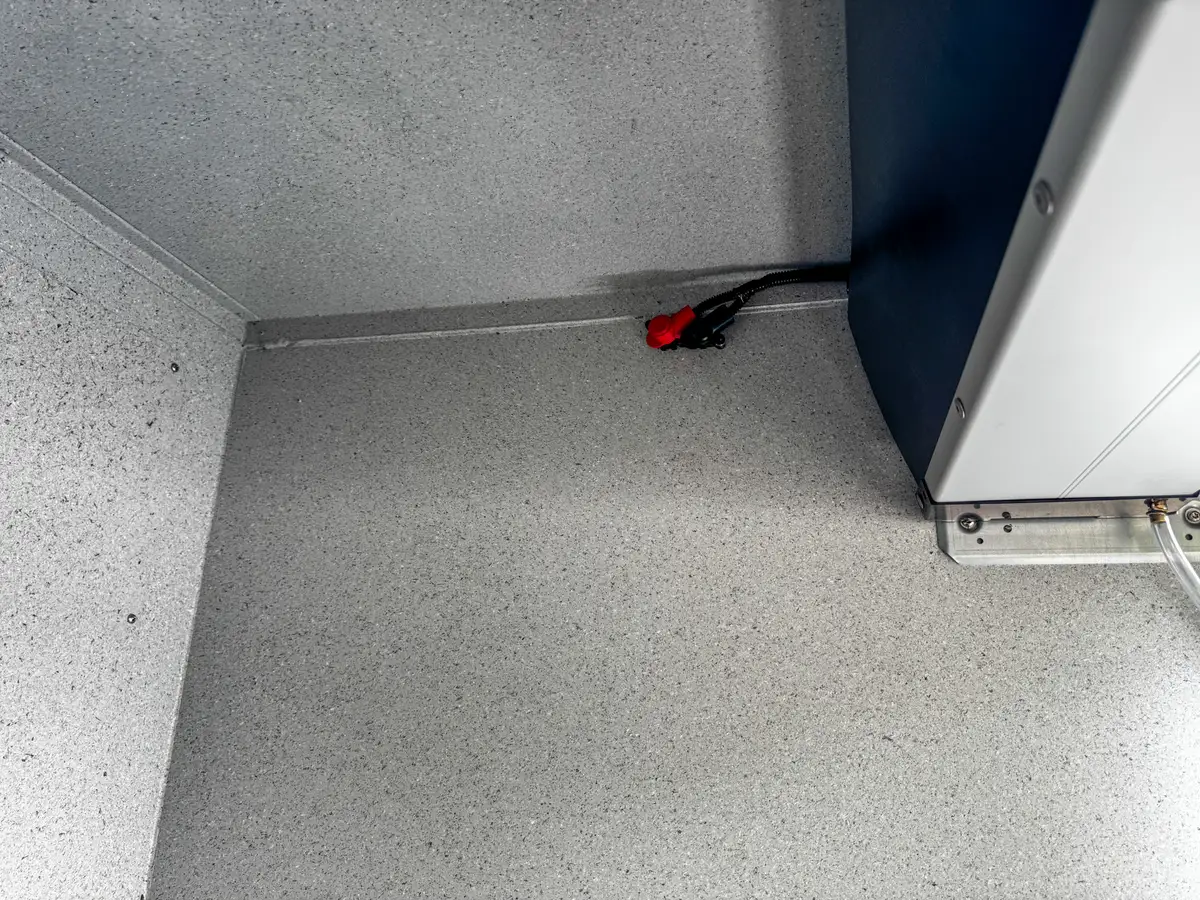 Top deck view showing hosebed grating, spare tire, and equipment bay layout.